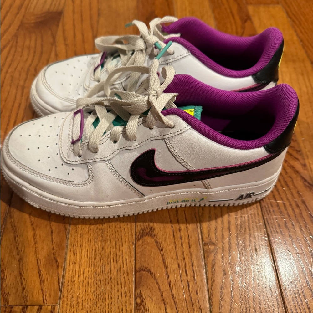 Nike Air Force White Sneakers with Purple and Black Accents